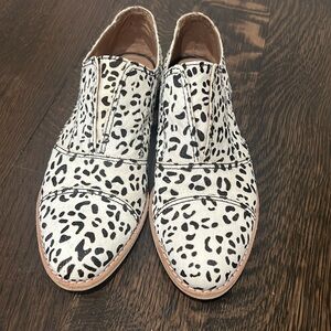 Black and white slip on shoes